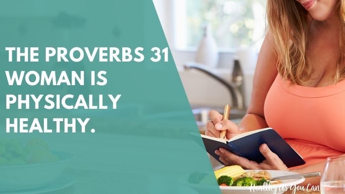 woman writing in a weight loss journal; teal overlay with proverbs 31 woman is physically healthy