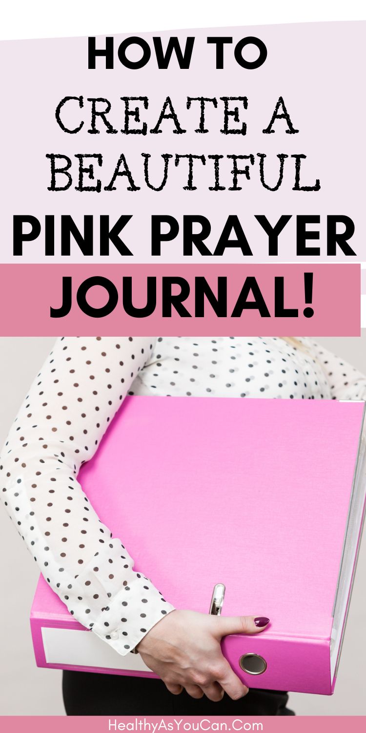 woman holding a pink binder 